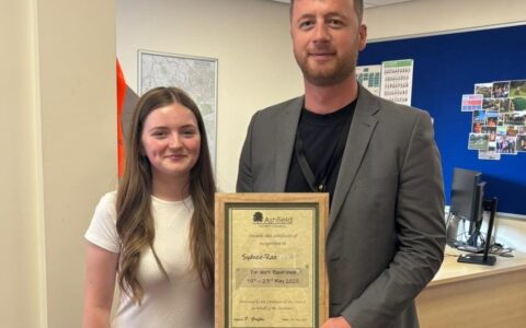 Student being presented with an award