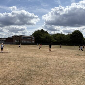 Students taking part in rounders