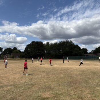 Students taking part in rounders