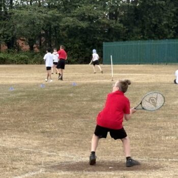 Students taking part in rounders