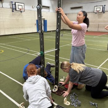 Students doing a team building exercise
