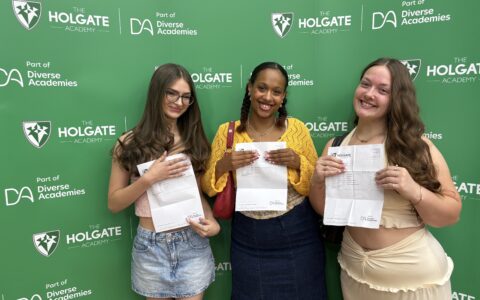 3 students celebrating a level results